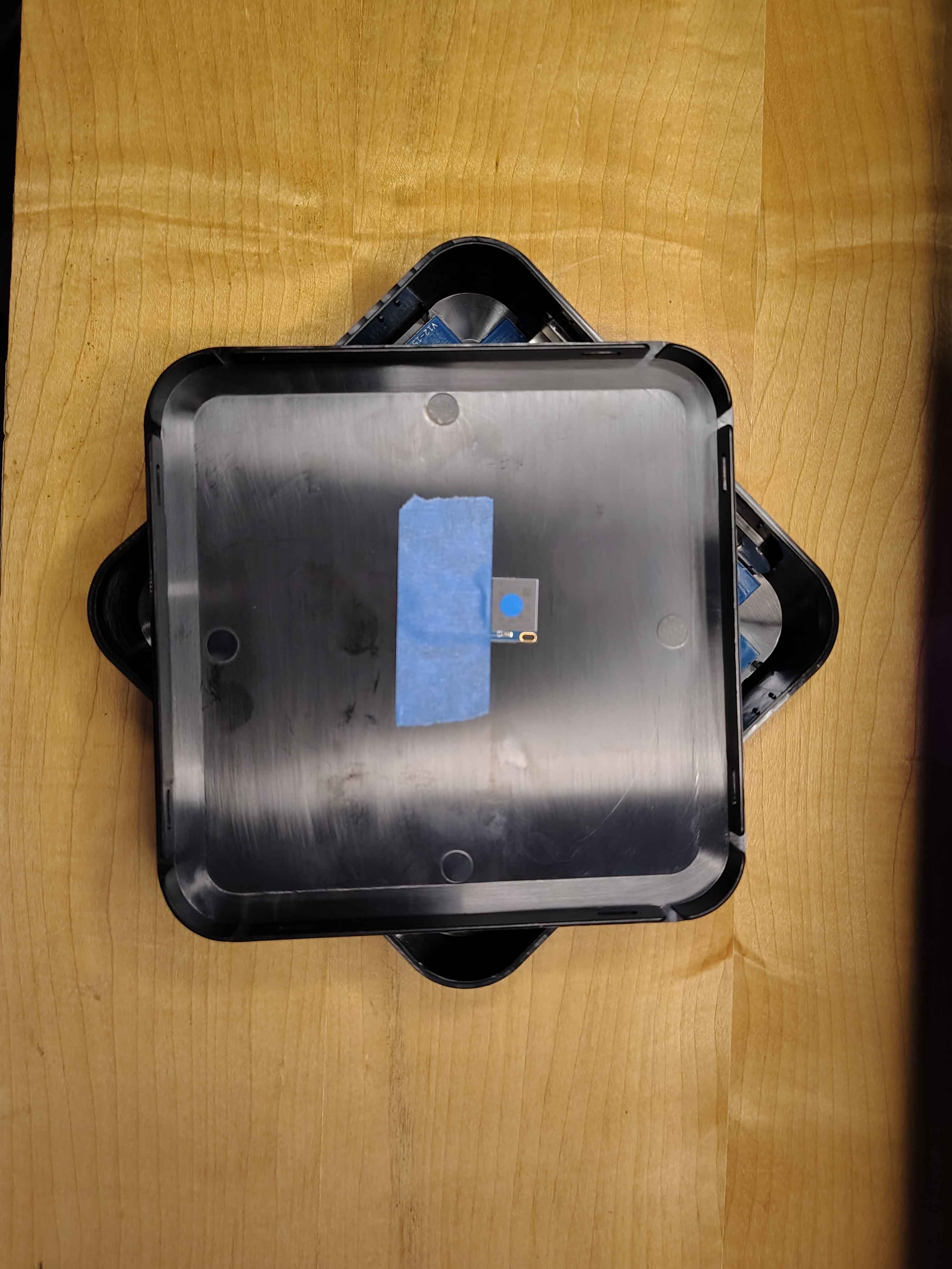 The original eMMC Key taped inside the top cover