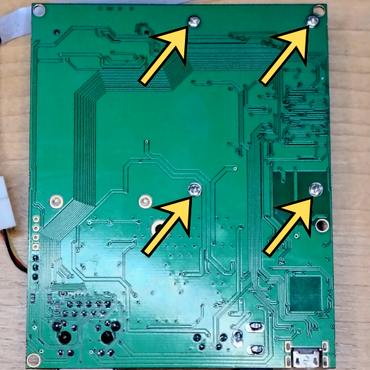 Flip the board over and remove the 4 Phillips heatsink mounting screws
